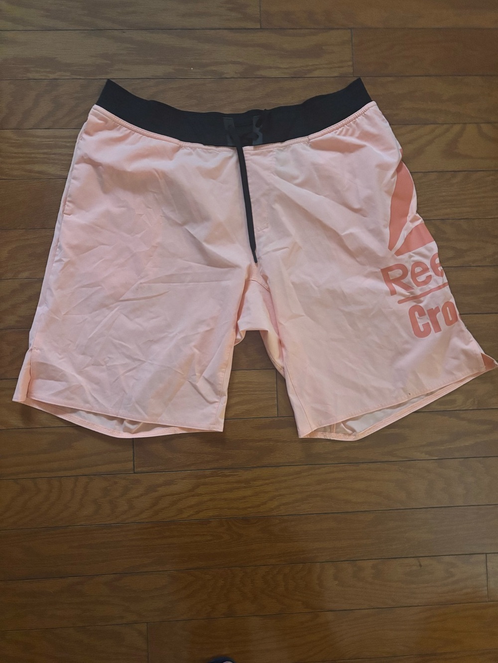 Reebok Men’s Light Pink Athletic Shorts with Black Waistband